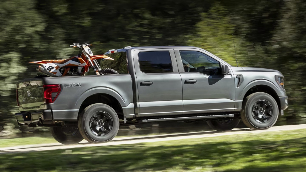 Ford F-150 with a Motorcycle in the bed