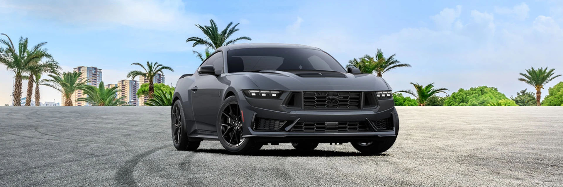 2026 Ford Mustang in Front of Palm Trees.