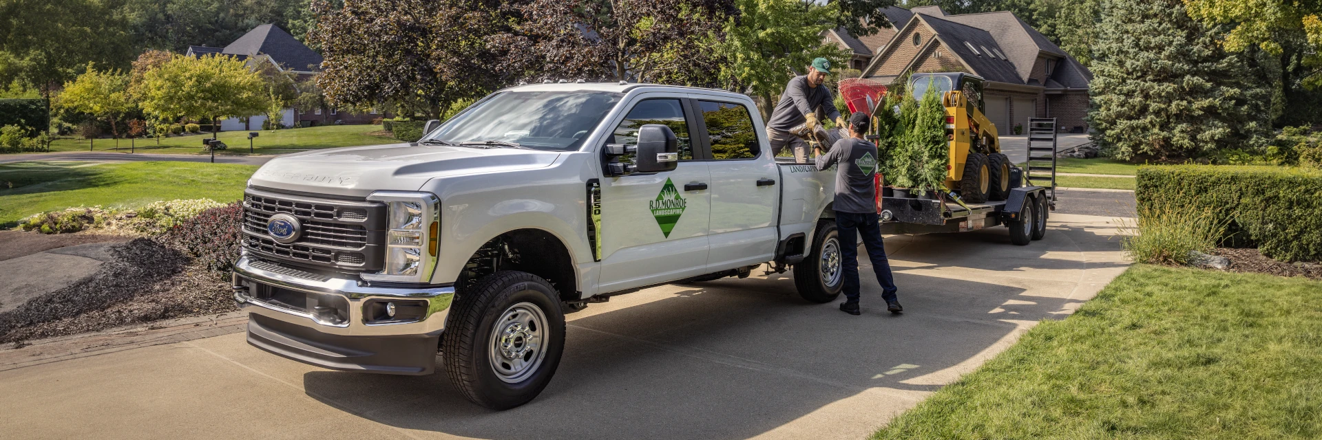 Ford Super-Duty being used by a Lawn Service company, hauling equipment